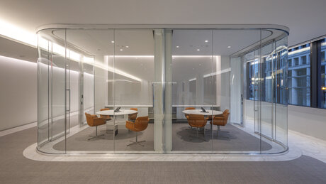 A conference room with transparent demountable partitions