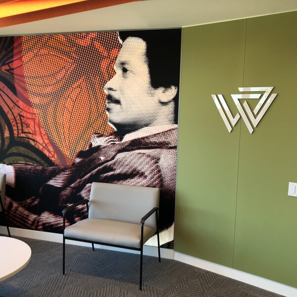 A mural of Max Robinson in the new Whitman Walker Health facility.