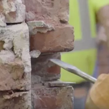 close up of brick work being done