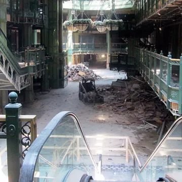 View from top of escalator of hollowed out building