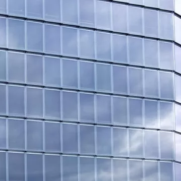 building with wall of glass windows