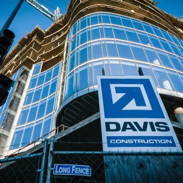 Exterior shot of a building with the DAVIS Logo prominently in front.