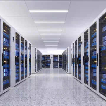 Data center room with multiple rows of server racks
