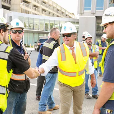 Construction men shaking hands 