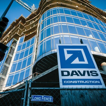 Exterior shot of a building with the DAVIS Logo prominently in front.