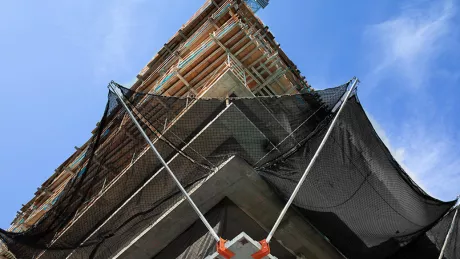 looking up at a building under construction