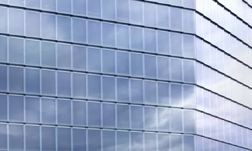 building with wall of glass windows