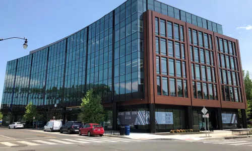 Exterior Shot of Parcel 17 at St. Elizabeth's - at the intersection of two roads, the glass facade sticks out!