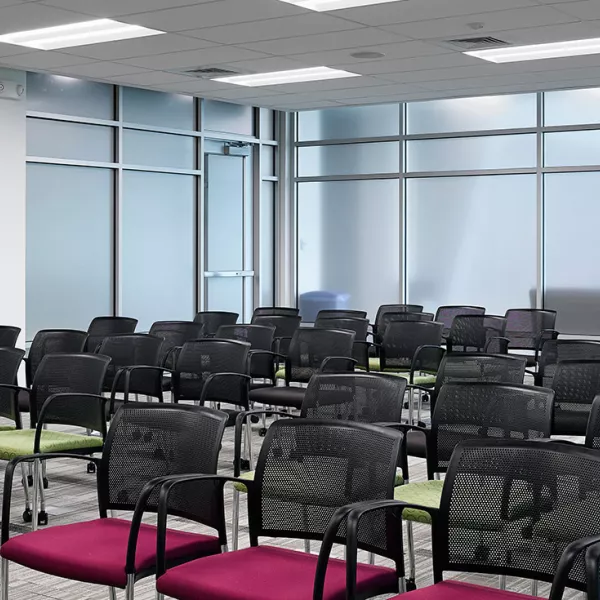 conference area set up auditorium style with chairs