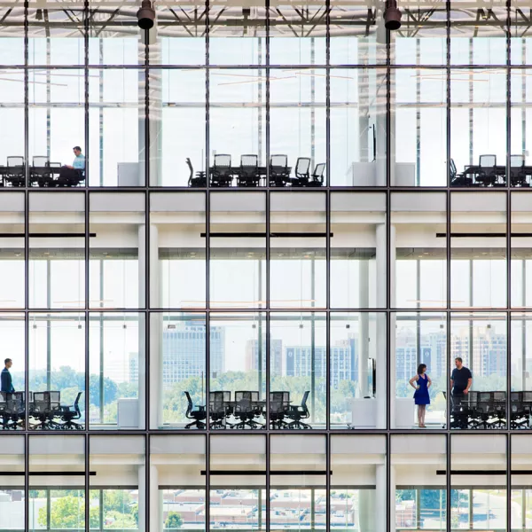 looking into office building with view of individual conference rooms