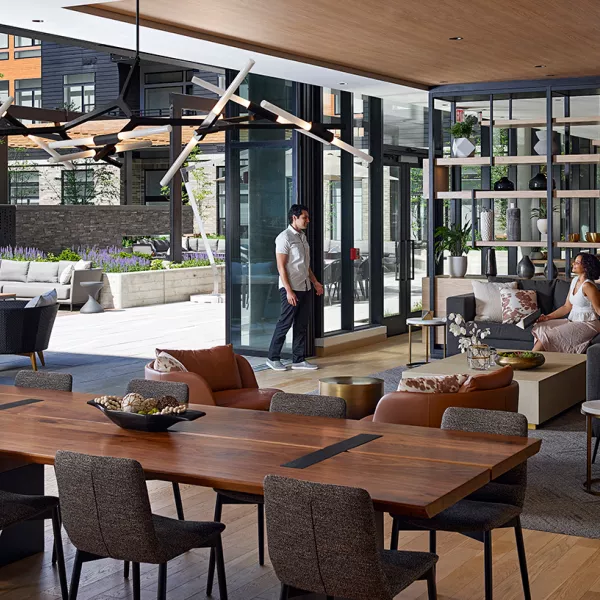 Arrowwood Apartments lounge + courtyard at dusk