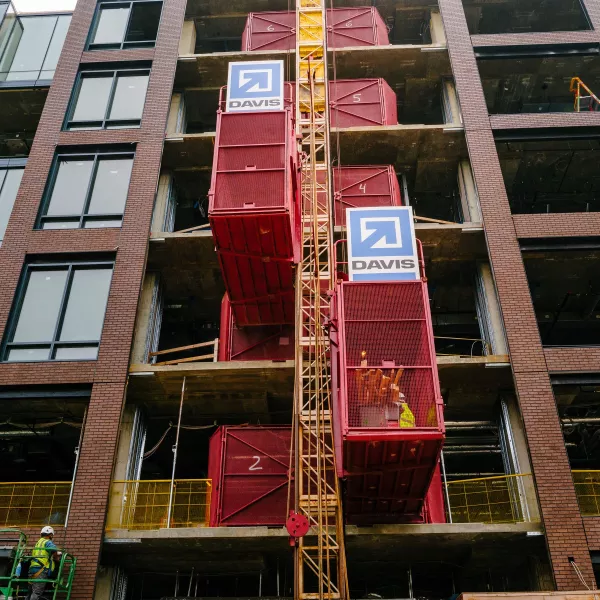 Exterior Shot of an Office Building in progress, with spaces for glass facade unfinished.