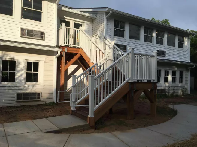 Exterior view of house with stair case leading to second floor